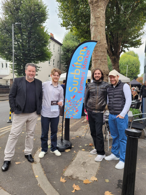 Surbiton Farmers' Market, Sept 2024, partnered by Thames Concerts. Pictured l-r: Ben Costello, Seb Priest (guitar), Teddy Humphrey (sax), Luca Wade (keys)